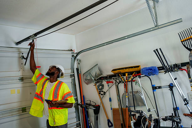 Professional Garage Door Panel Replacement technician working in Kent, OH